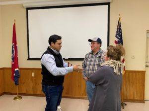 Charley Martinez talking to couple