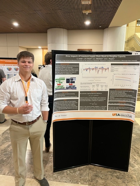 Cameron Jeske with his poster at UT Knoxville's Undergraduate Summer Research Scholars Symposium