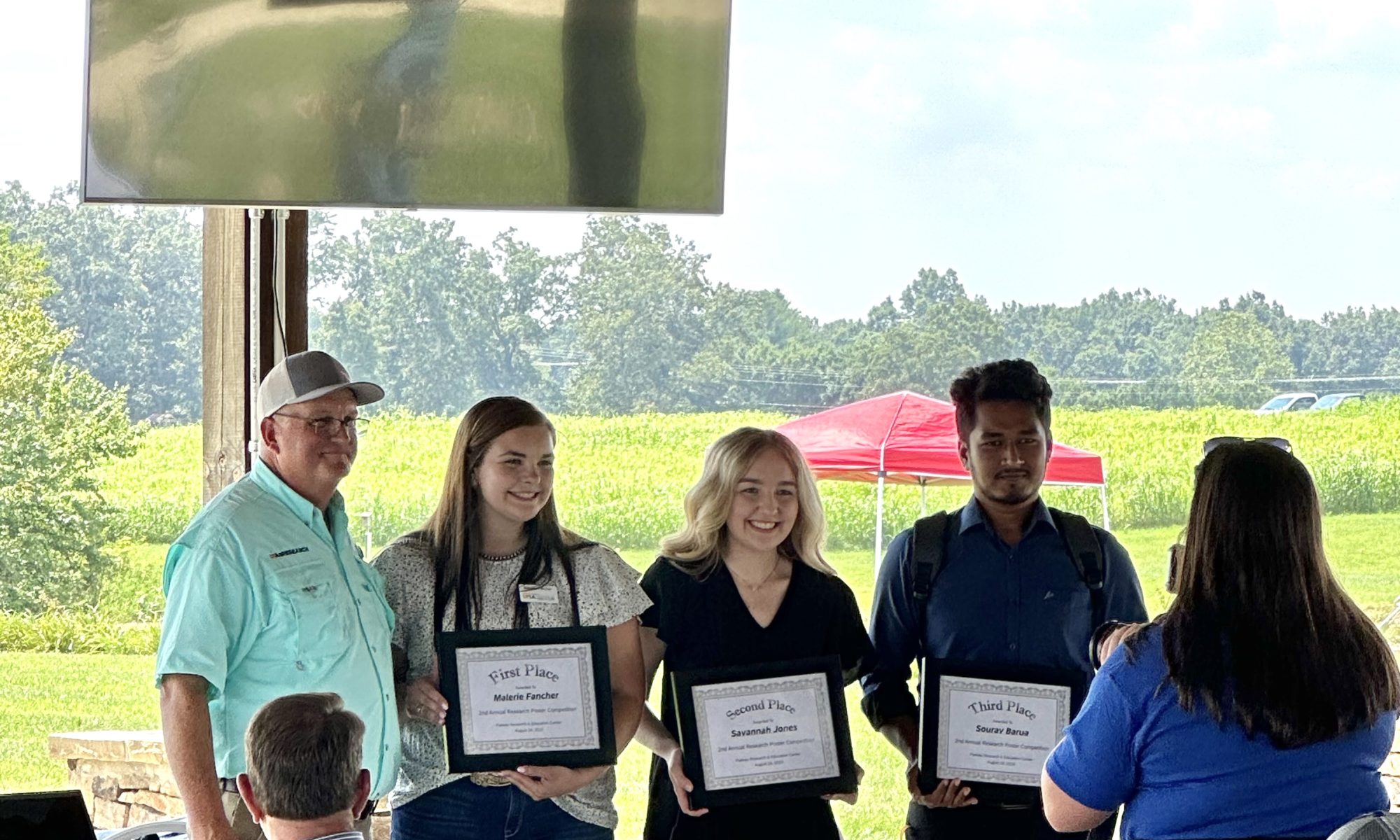 Walt Hitch, Plateau Research and Education Center Director with student winners of the 2nd Annual Research Poster Competition at the Steak and Potatoes Field Day