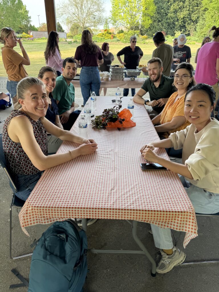 Students, faculty and staff enjoying the picnic