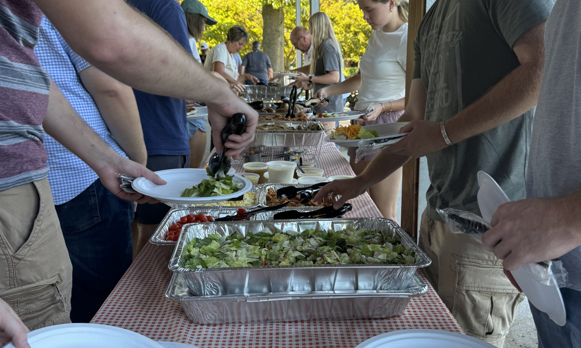 Students in line to get food at the Fall 2024 picnic