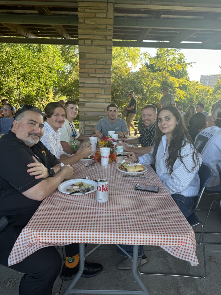 Interim Hebert College of Agriculture Dean, David White, and students enjoying time at the Fall 2024 picnic