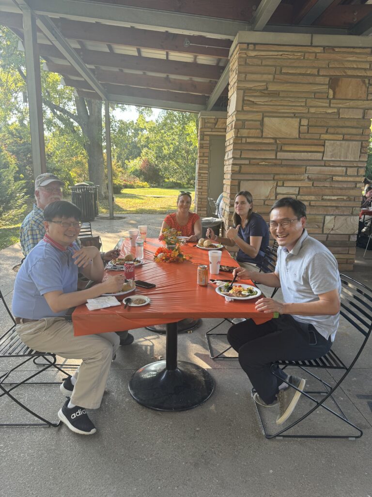 Faculty enjoying some time together outside of the office at the Fall 2024 picnic